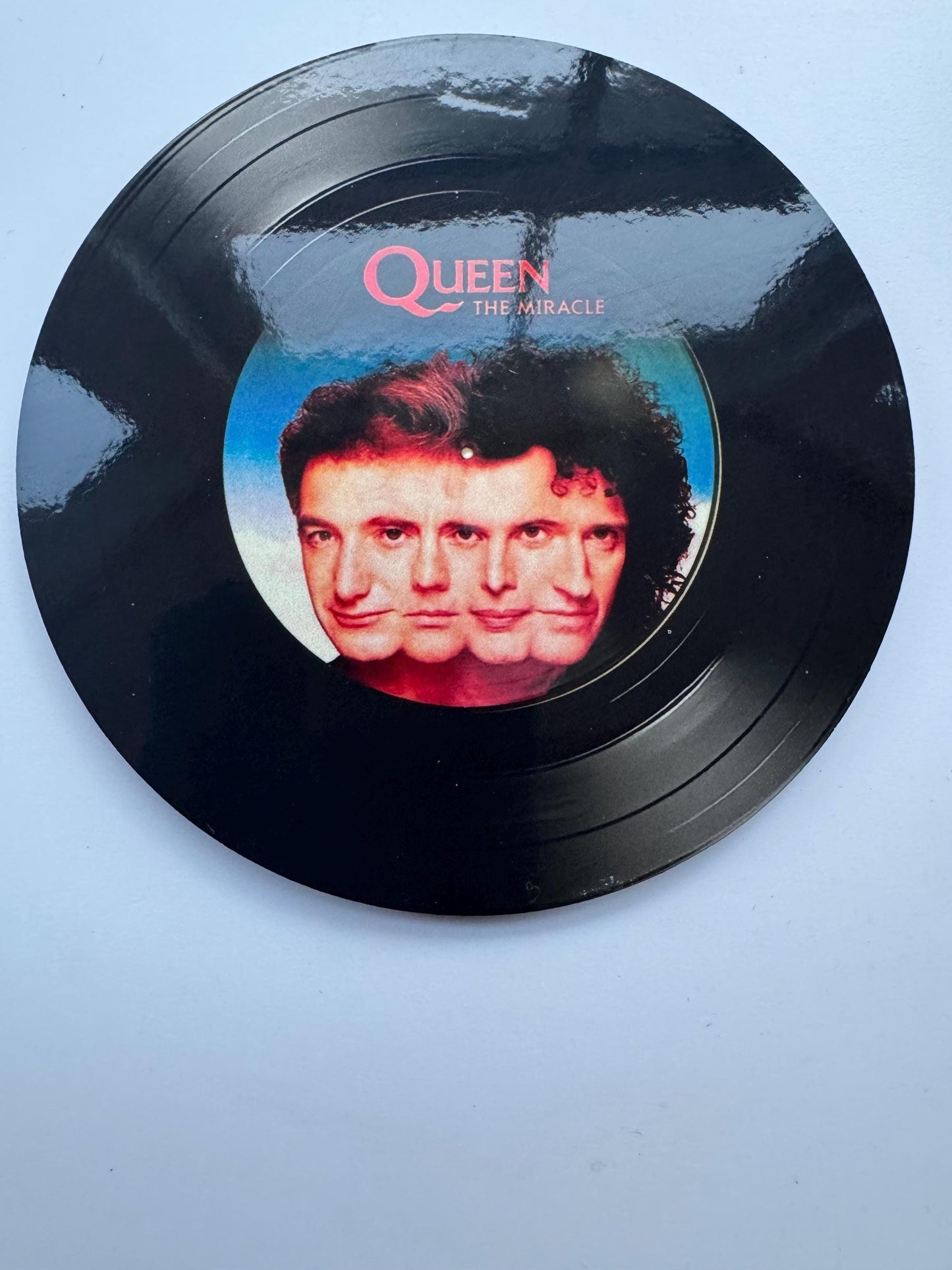 set of 4 round Queen record cover coasters| round coasters| record covers | man cave coaster| gifts for him | drink coasters