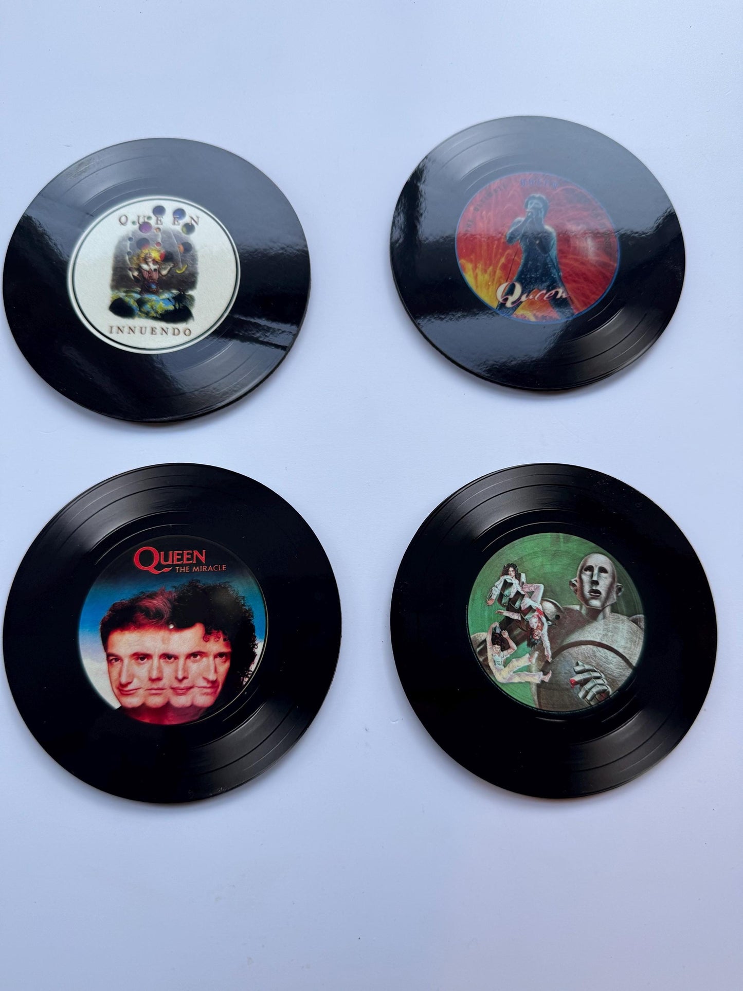 Set of 4 round Queen record cover coasters| round coasters| record covers | man cave coaster| gifts for him | drink coasters